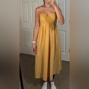 Light orange halter midi dress